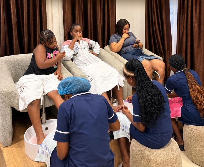 Little girls enjoying pedicures with BYT therapists